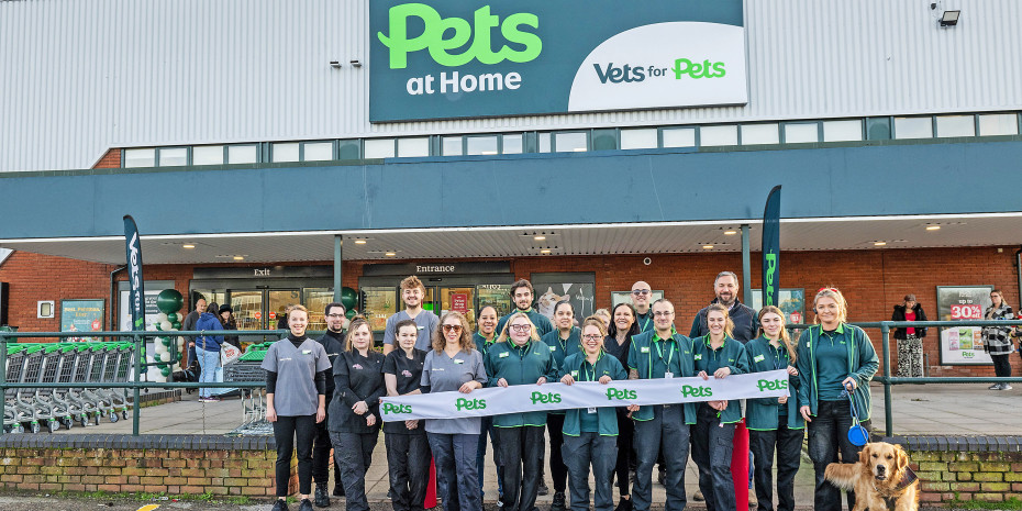 The team with Veterinary  Practice Owner Michelle Akande (sixth from left) and store manager Bart Kemal (fifth from right) opened the flagship store with a ­ribbon cutting ceremony.